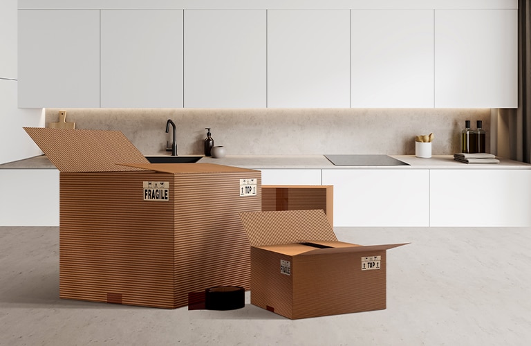 This is an image of boxes on the kitchen table.