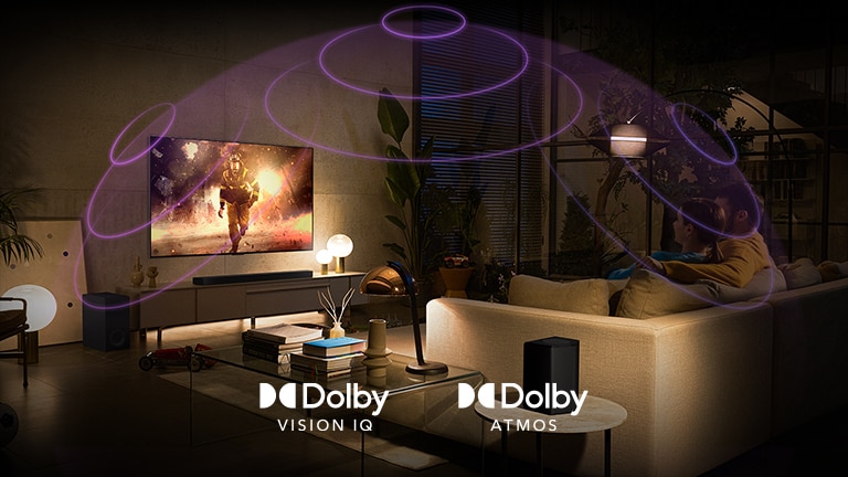 An image of an LG OLED TV in a dimly lit room showing a sci-fi movie. Soundwaves create a dome around the sofa and TV, depicting the immersion of Dolby Atmos and Dolby Vision.