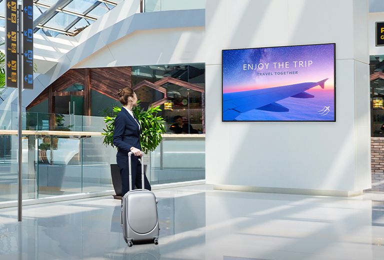 The display has been installed on a column at the airport, which is exposed to the bright sunlight. In spite of bright environment, advertisements on the display are clearly demonstrated.