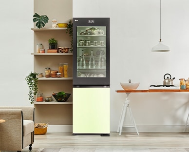 An image of a refrigerator placed in a living room with a cute interior.