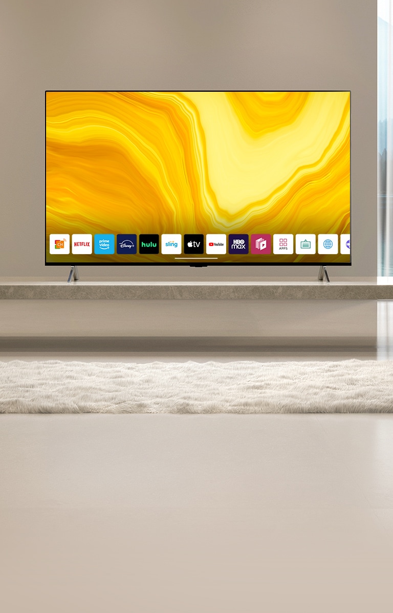 There shows a list of graphic UIs of LG QNED home screen scrolling down. Scene changes to show TV placed in yellow living room.