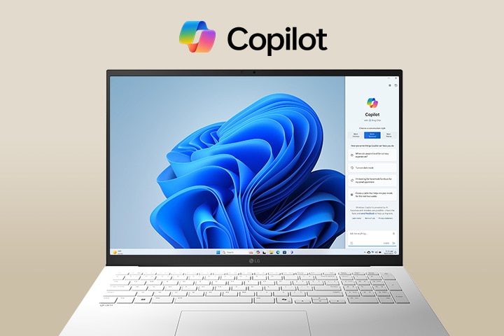 Un portátil con el logotipo y la interfaz de Windows Copilot sobre la pantalla, que muestra un diseño elegante y la interfaz de Windows 11 en segundo plano.