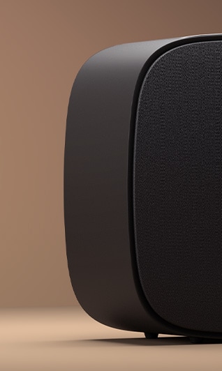 Vista lateral de un subwoofer Dolby Atmos que ofrece graves profundos para los mejores sistemas de cine en casa.