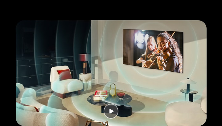 Le TV OLED LG dans un appartement moderne. Une grille apparaît sur l’image comme un scan de l’espace, puis des ondes sonores bleues se projettent depuis l’écran, remplissant toute la pièce de son.