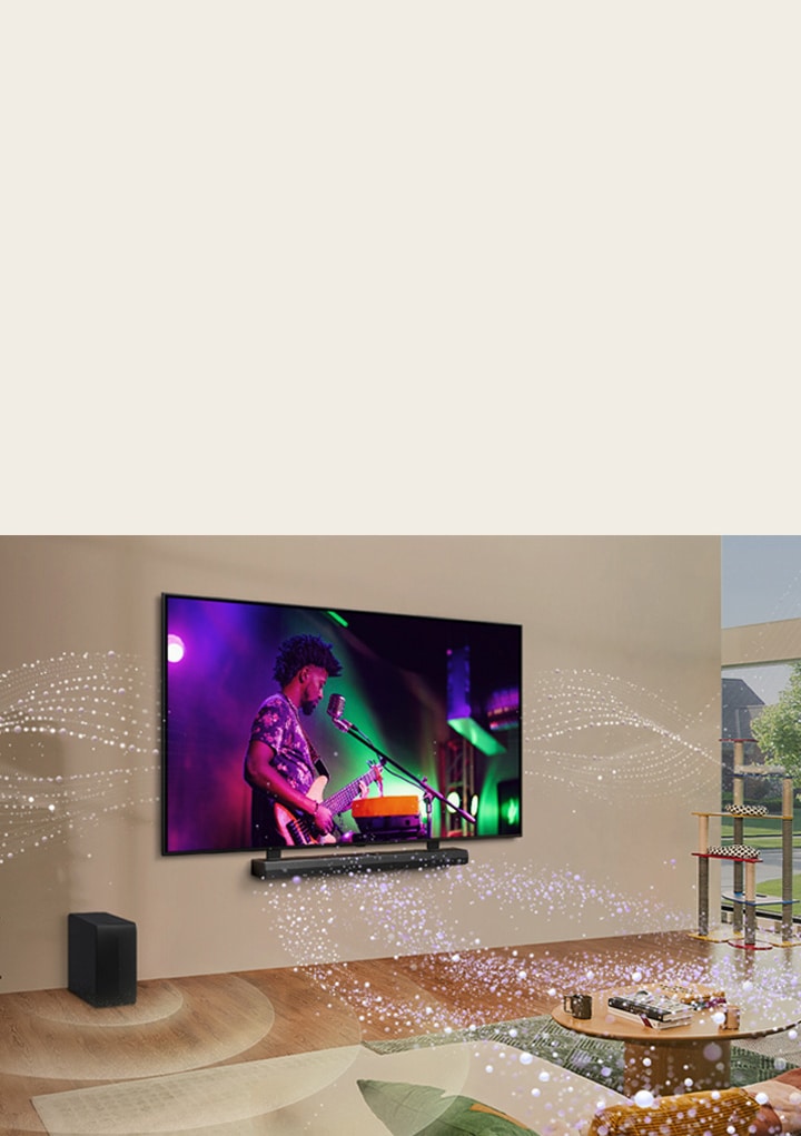 On voit le TV LG et la barre de son LG*** installés sur un mur dans un salon et les graphiques aux formes brillantes dans toute la pièce.