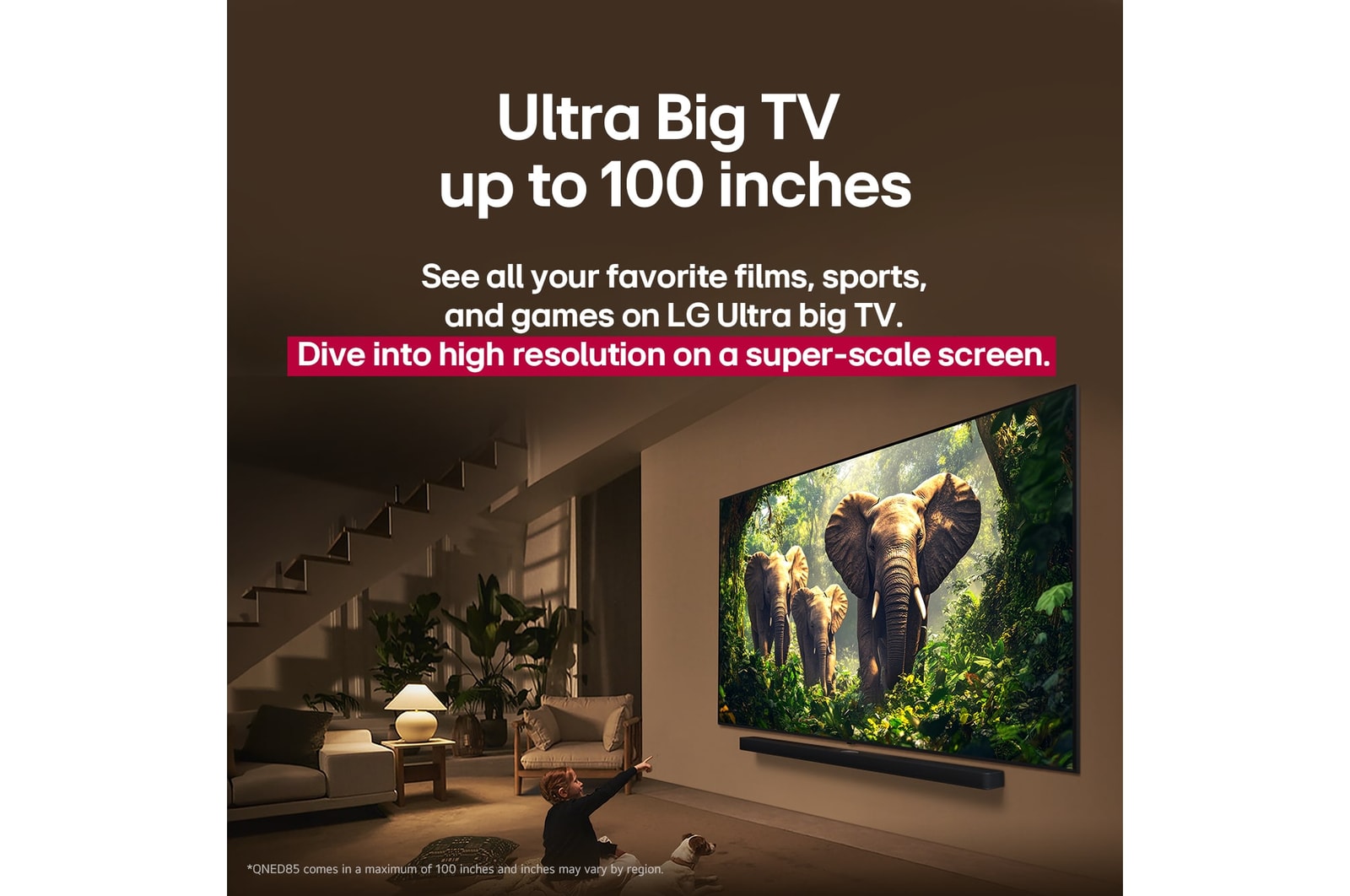 A girl and a dog are seated in front of a LG QNED TV mounted on a wall depicting three elephants walking outwards above a LG Soundbar. The short text describes how every action is more thrilling on a massive screen.