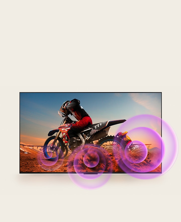 La LG QNED TV représente un homme sur une moto avec des cercles violets abstraits sortant de la roue pour visualiser l’émission sonore.
