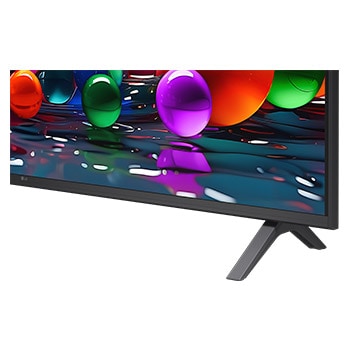 LG TV avec un écran d’une taille impressionnante fixé sur un mur au-dessus d’une LG Soundbar dans un salon au style moderne.