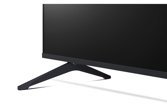 Télécommande AI Magic Remote de LG en face d’un écran de LG TV. L’écran affiche un message d’accueil personnalisé de LG AI avec des mots clés personnalisés en fonction de l’historique de recherche et de visionnage de l’utilisateur. À côté de la télécommande se trouve une icône et une étiquette montrant que la fonctionnalité AI Concierge est facilement accessible en appuyant brièvement sur le bouto