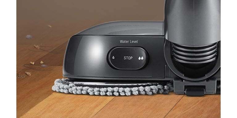 Vue du bouton de contrôle de l’eau en 3 étapes sur l’aspirateur. Il comporte l’étape 1, l’étape 2 et l’arrêt.