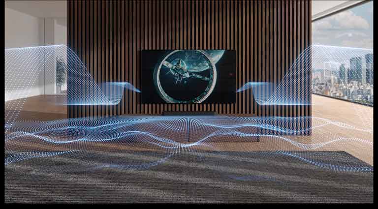 Des ondes sonores de couleur bleue aux formes variées sont émises par la barre de son et le téléviseur.