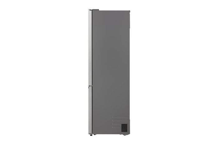 Réfrigérateur congélateur LG (gbbsj20dpy) intégré dans une armoire marron foncé avec fenêtre et canapé à gauche et évier à droite