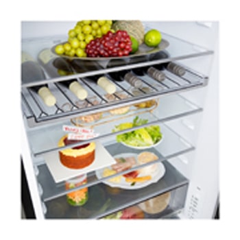 LG fridge freezer (GBBW726AEV) built into dark brown cabinetry with window and sofa on left and sink on right