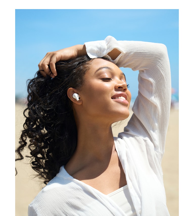 A person is lying in bed sleeping peacefully while wearing T60 earbuds.