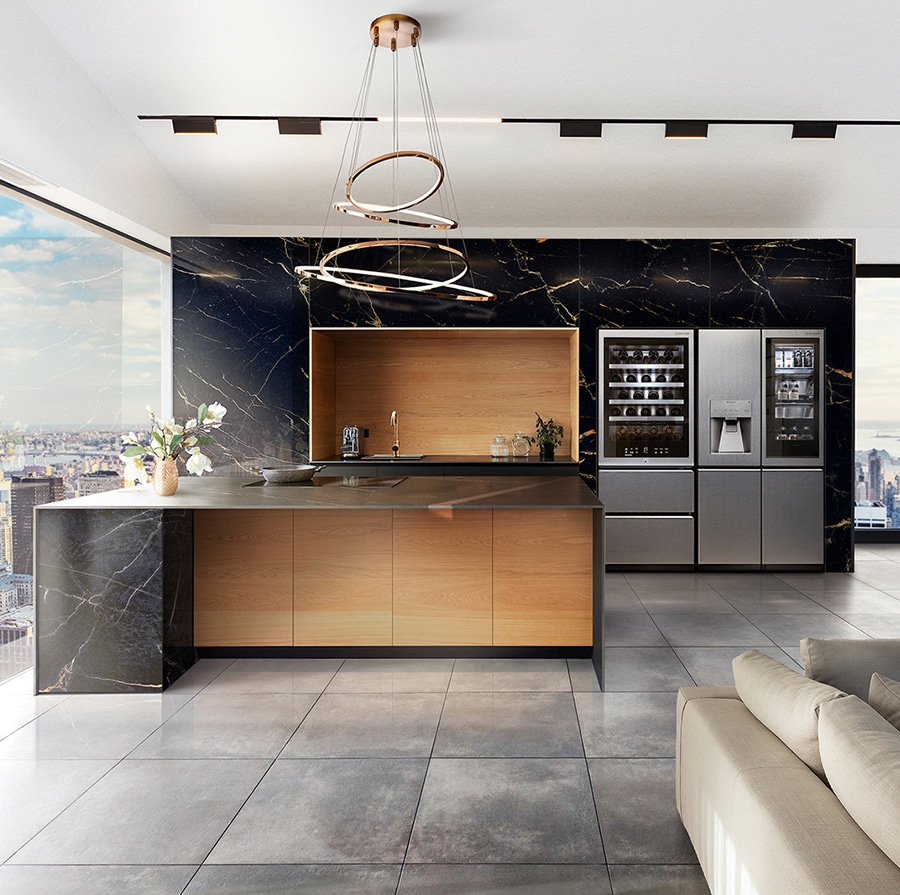 LG SIGNATURE Refrigerators are placed on the kitchen, which is decorated by Nero Portoro marble, with the city backdrop.