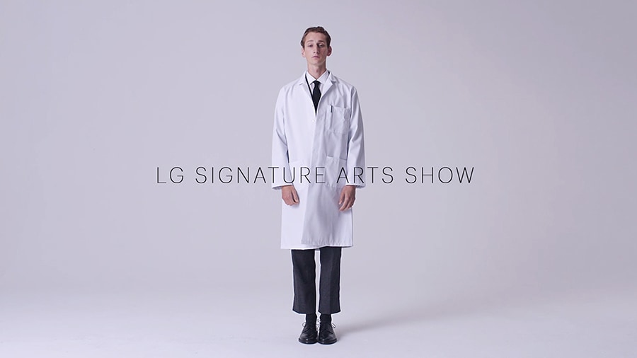 a model is standing for explaining lg signature products