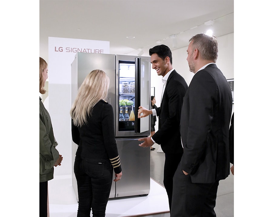 several people are talking about lg signature refrigerator at launching event in nordics