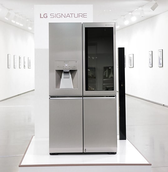 lg signature refrigerator is displayed right on the middle of the lg signature launching event in nordics