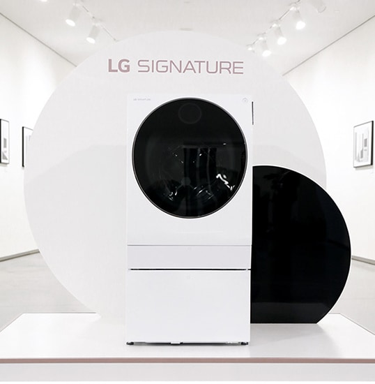 lg signature washing machine is displayed right on the middle of the lg signature launching event in nordics