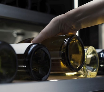 Various champagnes are placed on the pantry of LG SIGNATURE Wine Cellar.