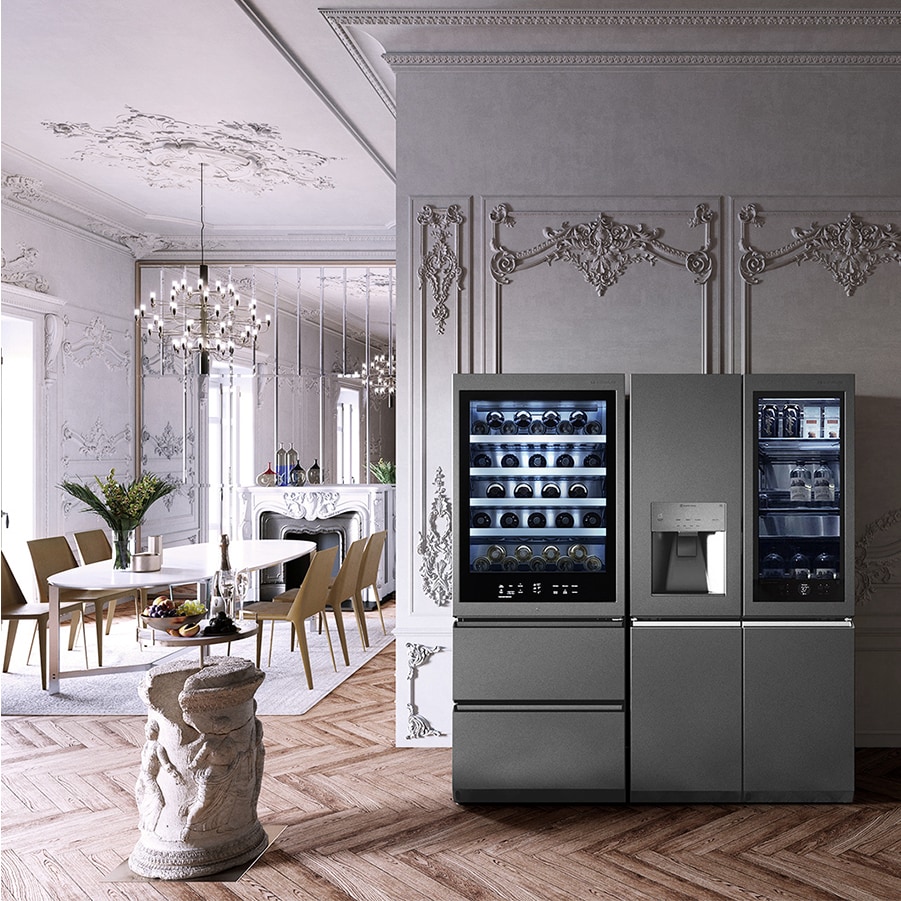 LG SIGNATURE Refrigerator and Wine Cellar are placed in the Victorian style dining room with Flexform's Clarke dining table.