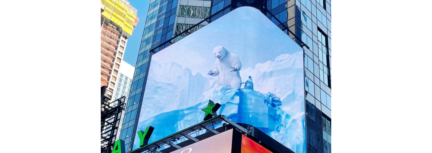 LG's digital billboard in Time Square, New York displaying an illustration of a big polar bear