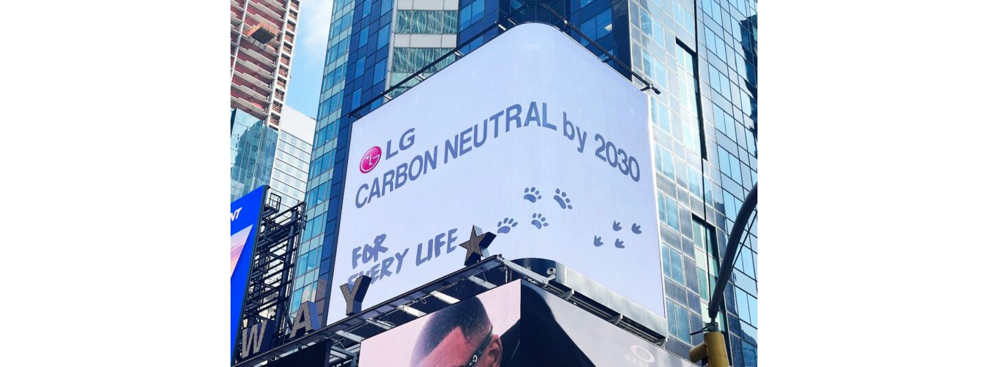 LG's digital billboard in Time Square, New York displaying an illustration with the phrase, 'Carbon Neutral by 2030'