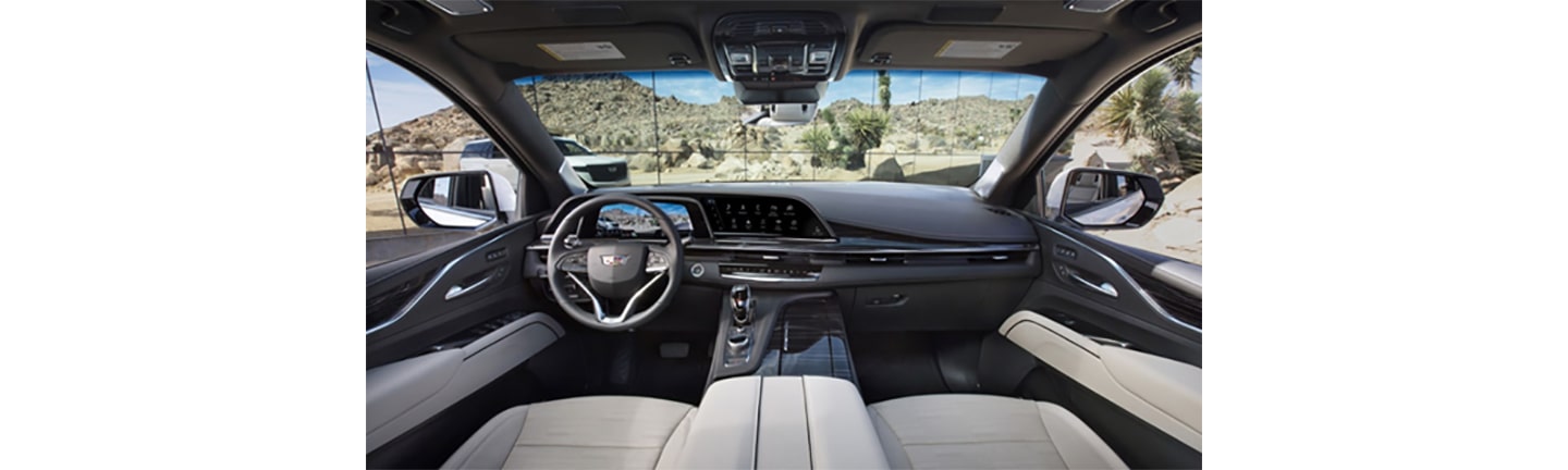 An image showing the front interior design of a Cadillac with LG’s infotainment system on show