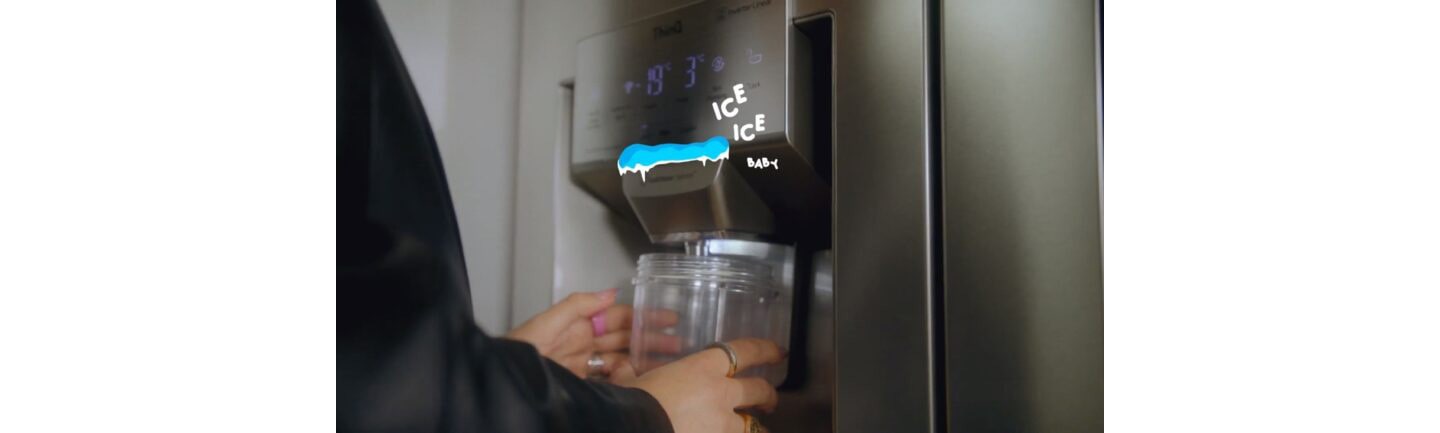 Influencer Irina Hp collecting cool, refreshing water from her LG InstaView Door-in-Door refrigerator.