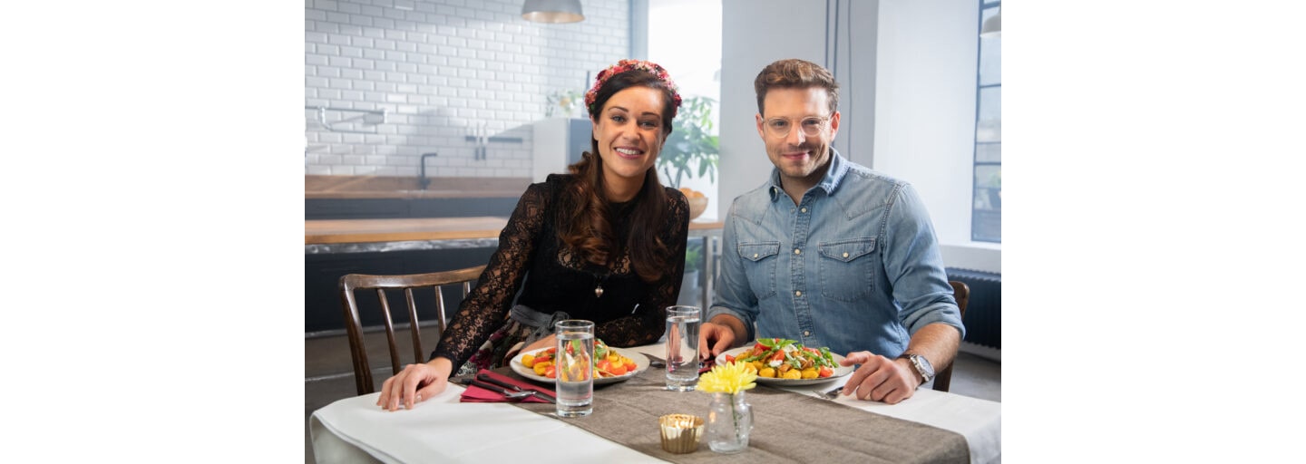 Food blogger CookingCatrin and Jakob Glanzer, the host of LG KitchenLife Stories, posing with the dishes they just made together.