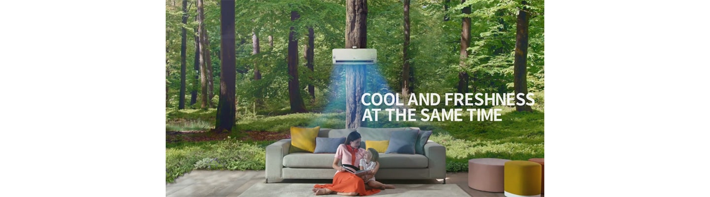 A picture of woman and child reading a book as they sit under LG DUAL COOL, as if they’re sitting in the middle of a dense forest