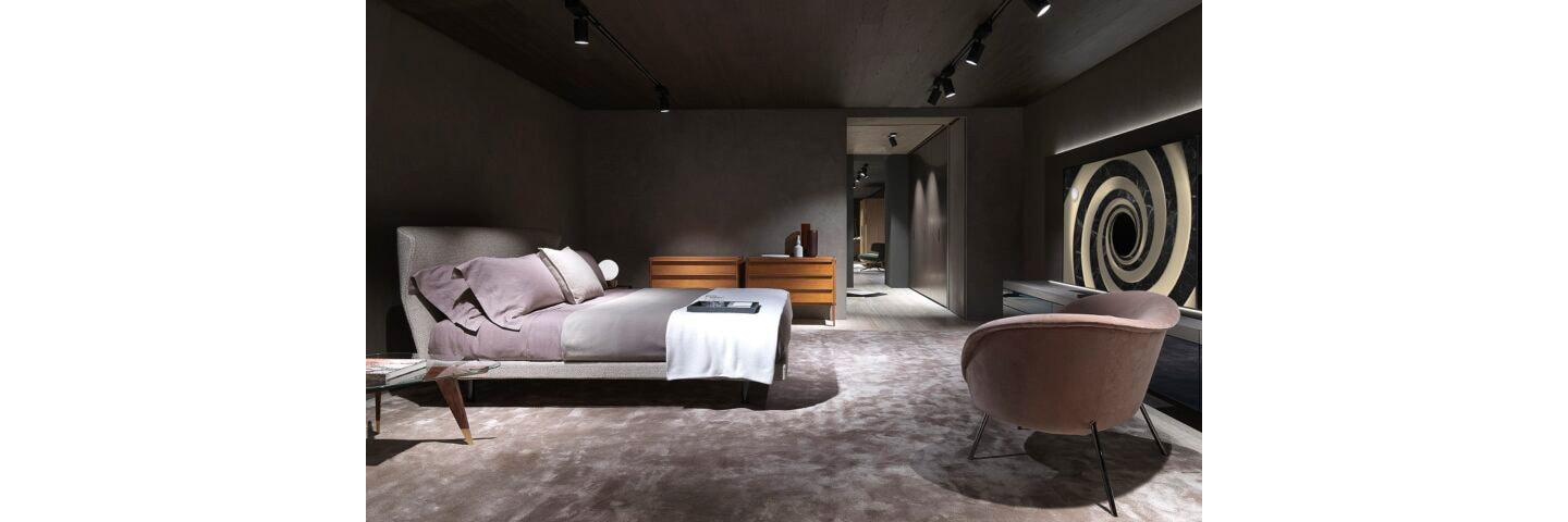 The interior of the Molteni&C flagship store in Paris where LG OLED TV harmonizes with luxurious bedroom furniture.