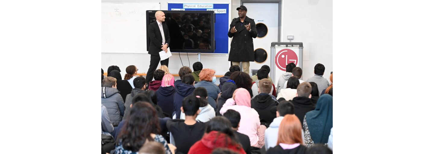 Emile Heskey, the English football legend, inspiring students at their school during assembly.