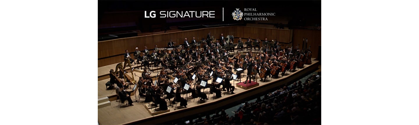 The Royal Philharmonic Orchestra playing in a concert hall with the logos of LG SIGNATURE and the orchestra above