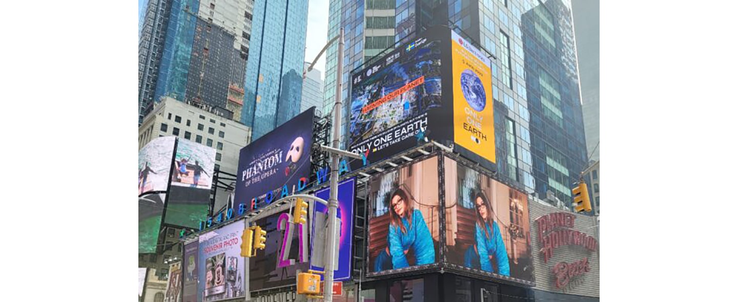 The overall view around LG's digital billboard in Time Square, New York displaying a video of LG's Only One Earth campaign