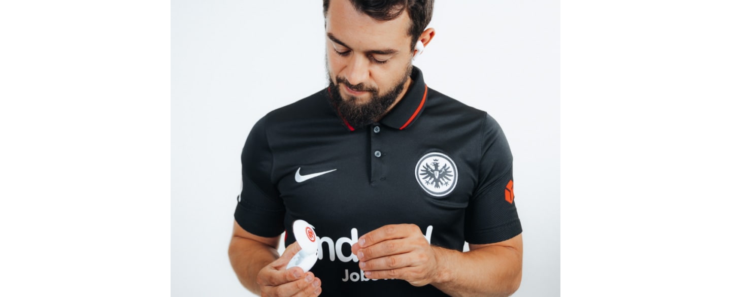 Amin Younes, attacking midfielder for the Bundesliga’s Eintracht Frankfurt football club, posing with the Eintracht Frankfurt TONE Free