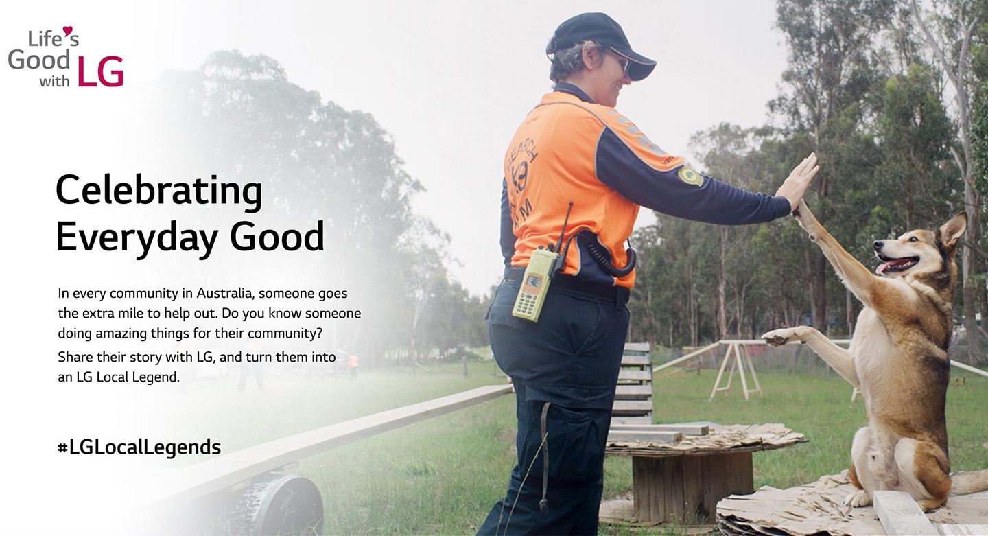 A promotional photo of the LG Local Legends program featuring a search dog and its trainer high fiving.