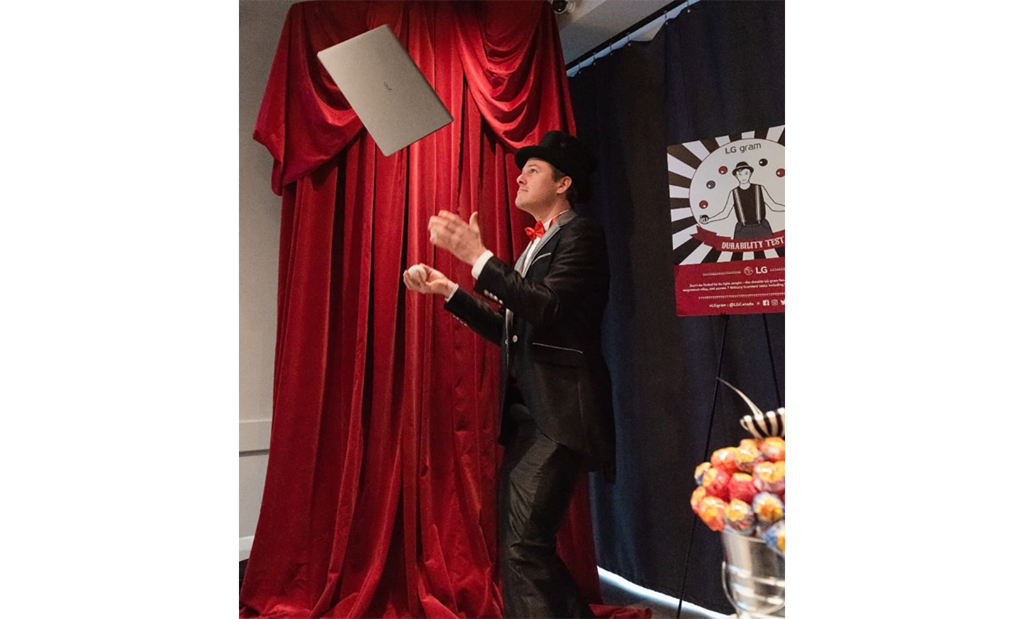 An entertainer uses LG gram in his juggling routine while on stage at an LG event