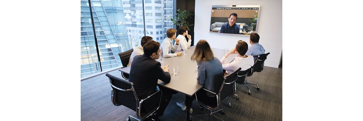 A team meeting with colleagues taking a video call via LG’s One:Quick Works.