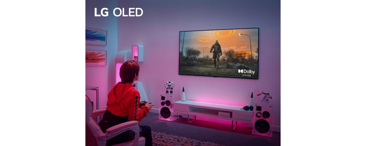 A gamer being completely immersed in a video game at home thanks to LG OLED TV’s Dolby Vision at 4K 120Hz