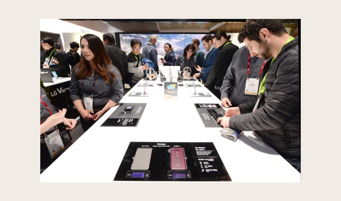 Numerous CES attendees test out the new features of LG's smartphones including LG V40 ThinQ