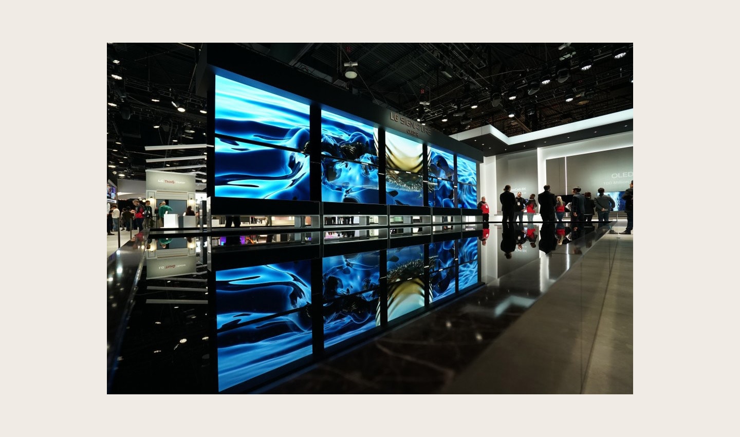 Ten LG SIGNATURE OLED R TVs, five hanging upside down, create an awe-inspiring display at the company’s CES 2020 booth