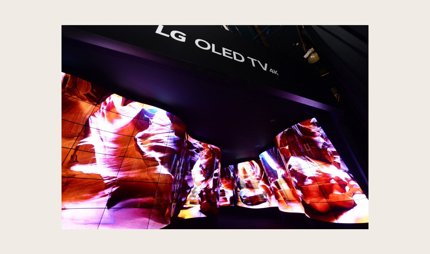 Entrance view of the LG OLED Canyon where beautiful desert scenes are displayed on a winding passage of connected OLED panels