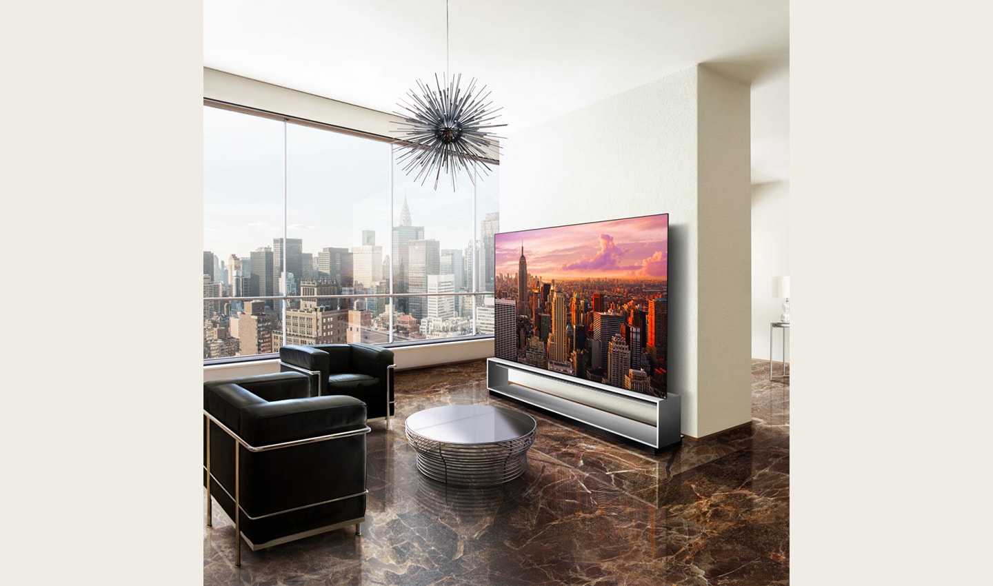 Earth meets metal in this luxurious living space, fusing the unique, high-end characteristics of the Marron Emperador marble floor with the cool steel of the OLED TV's Art Furniture Stand. The 8K resolution of the OLED TV blended with the natural elements of the smooth marble floor giving out the perfect juxtaposition to LG SIGNATURE's technology, offering a superior viewing experience.
