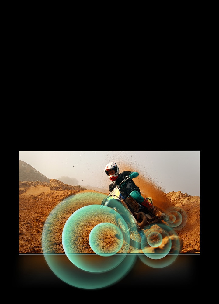 A man riding a motorbike on a dirt track with bright circle graphics around the motorbike.	