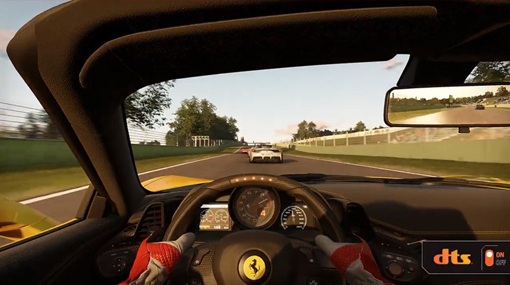 A DTS video of Project Cars 2 is attached. A screenshot is a view from a racer's perspective sitting in racing car on a racing rail and there is a DTS logo right bottom corner of image.