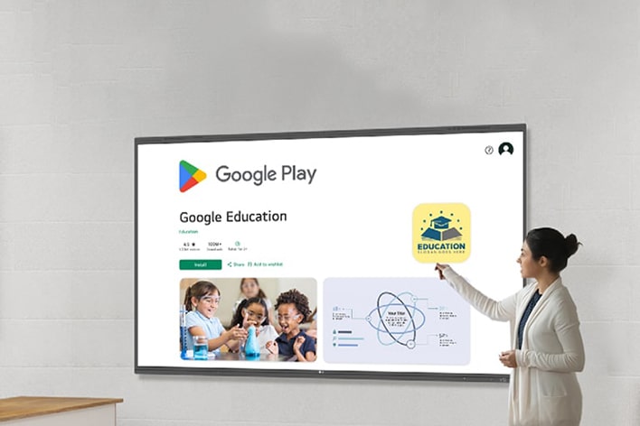 A woman is browsing the Google Play Store, downloading educational apps. This is possible as LG's smart board is a Google Certified interactive whiteboard.