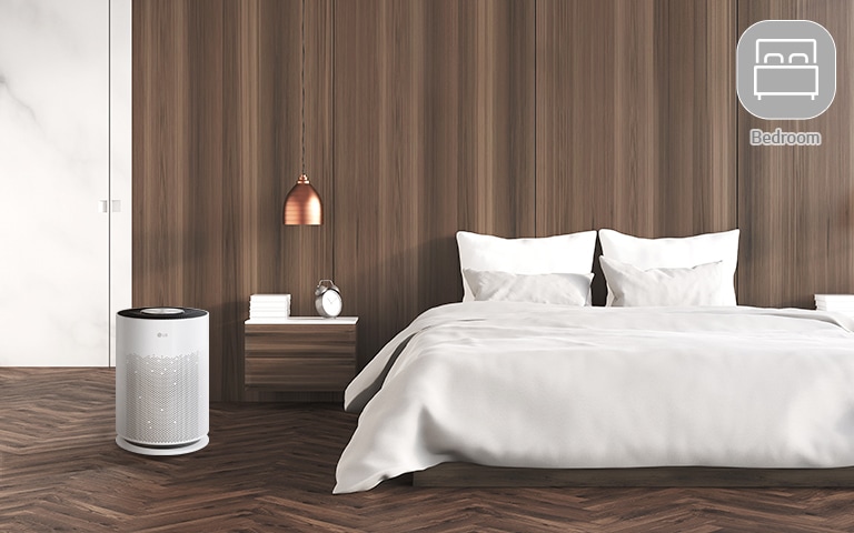 An air purifier is located in the bedroom.