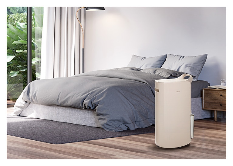 It shows calming beige color LG Puricare™ Dehumidifier is placed in a modern livingroom.