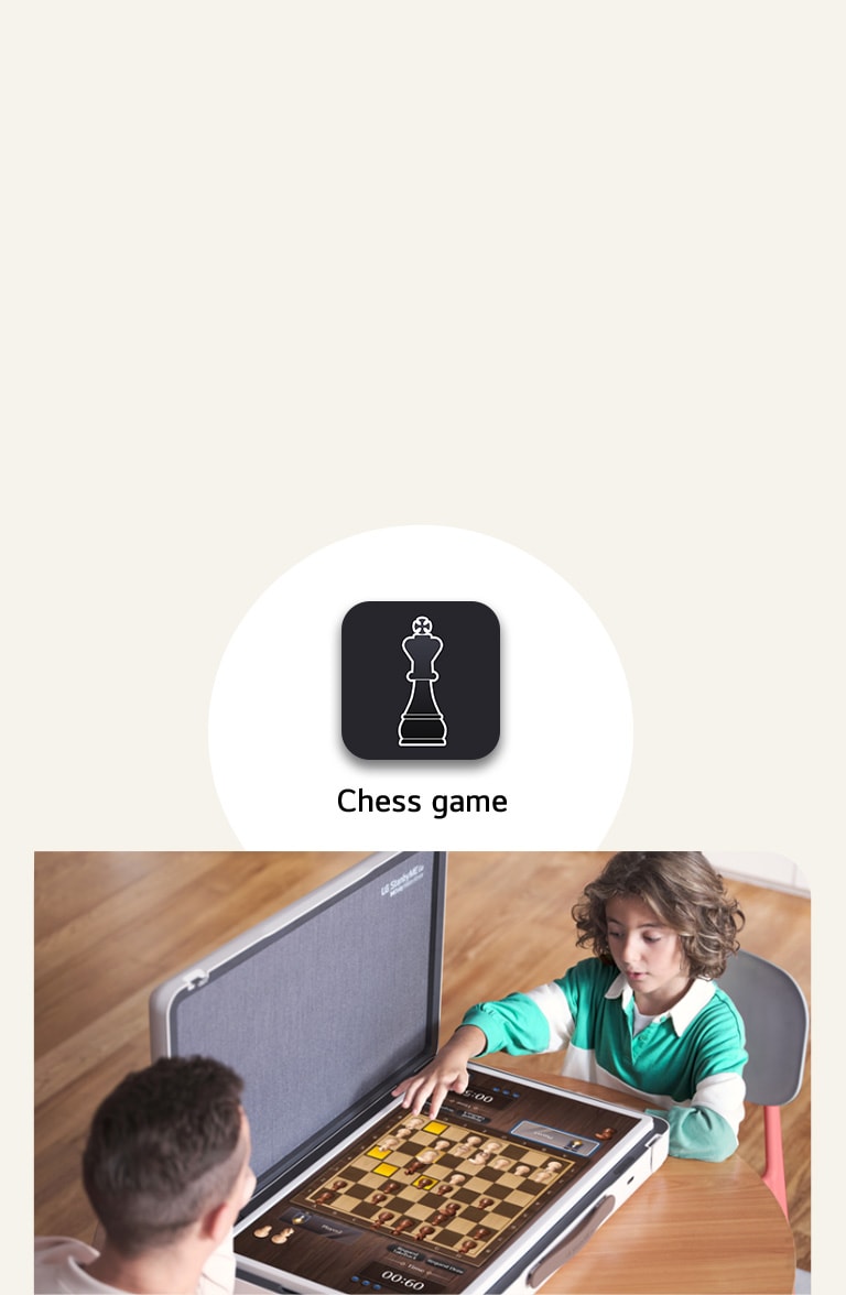 Father and son plays chess game through the LG StanbyME Go. In the middle of the image, Chess game icon is shown.